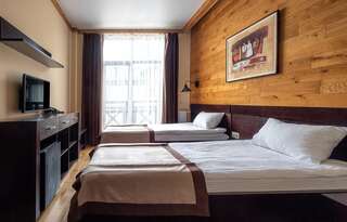 Отель Chalet du Mont Буковель Двухместный номер с 2 отдельными кроватями и балконом-2